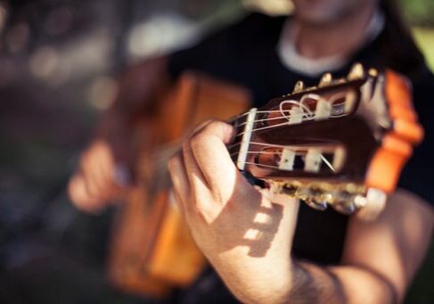 A live guitarist brings a warm and welcoming touch to your ceremony