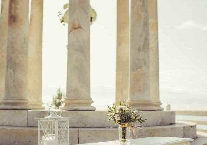 A lantern and candle on the altar table are an apt way to remember an absent loved one during your ceremony